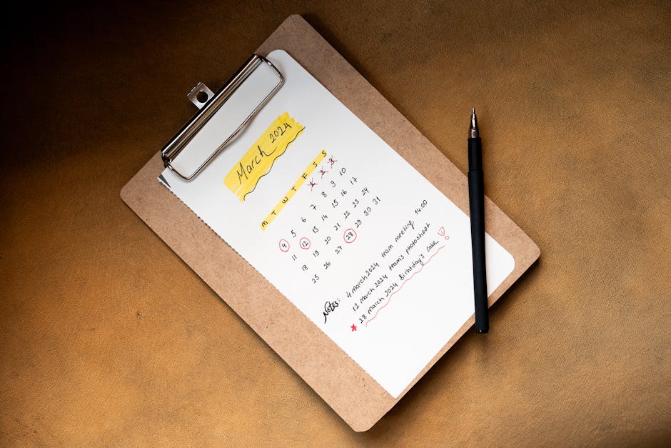 Wedding planner reviewing timeline on clipboard